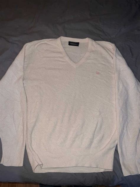 cream dior sweater